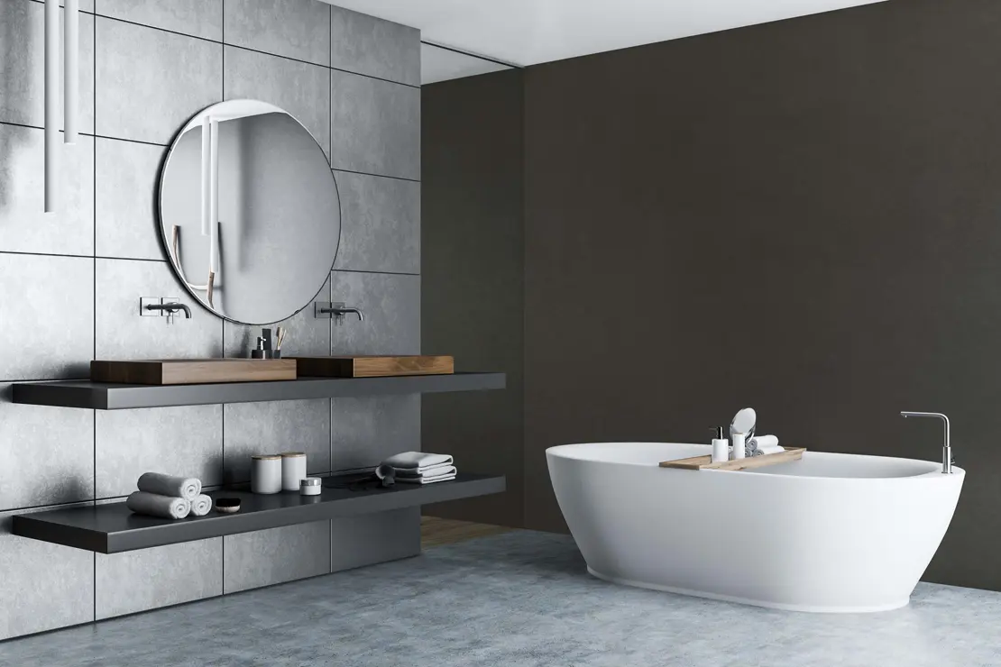 Salle de bain avec des murs en béton ciré gris foncé. Salle de bain avec des murs en béton ciré gris foncé.